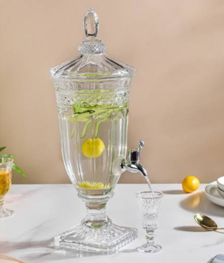 Clear glass juice dispenser