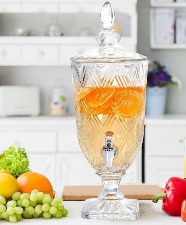 Clear glass juice dispenser